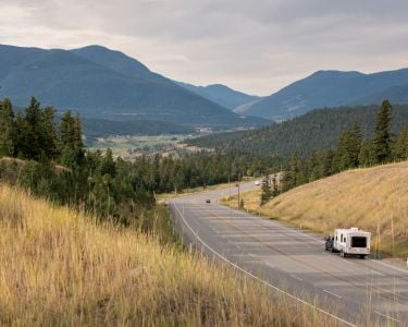 An RV traveling down a highway in British Columbia