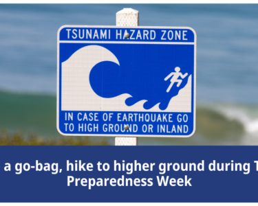 Tsunami Hazard Zone sign with text, 