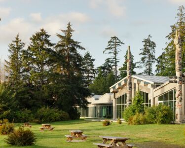 Exterior of totem poles at the Haida Heritage Centre in Kay Llnagaay (Skidegate).