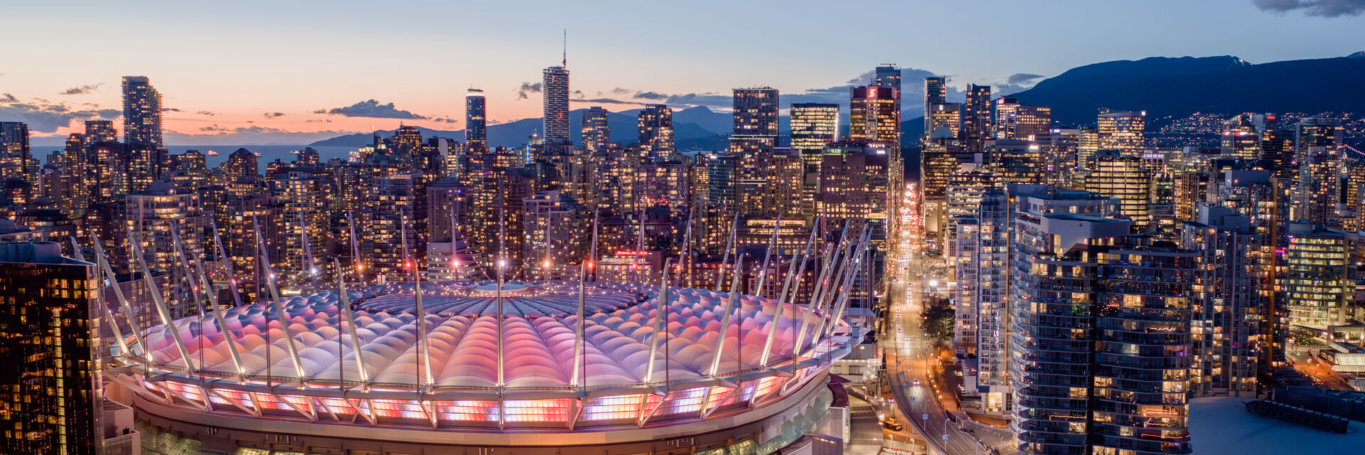 Aerial view over BC Place in Vancouver at dusk.