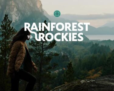 Person walking up a mountain with trees, a mountain and water in the background, and a logo superimposed.